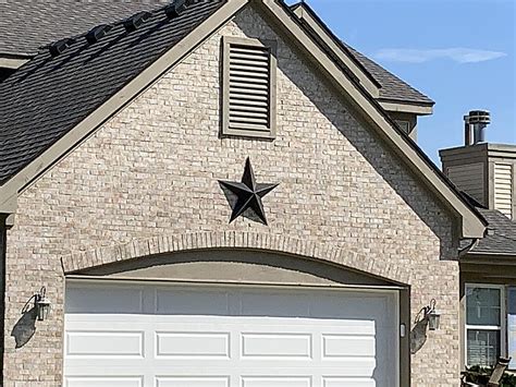 what do the large metal stars on houses mean|big metal star on house.